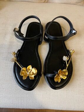 Black Sandals with Gold Floral Accent